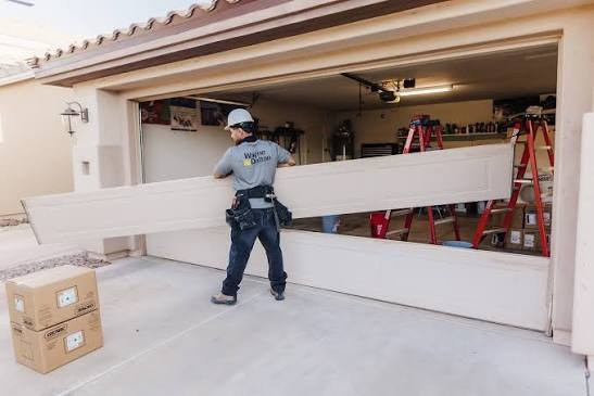 Garage door panel installation